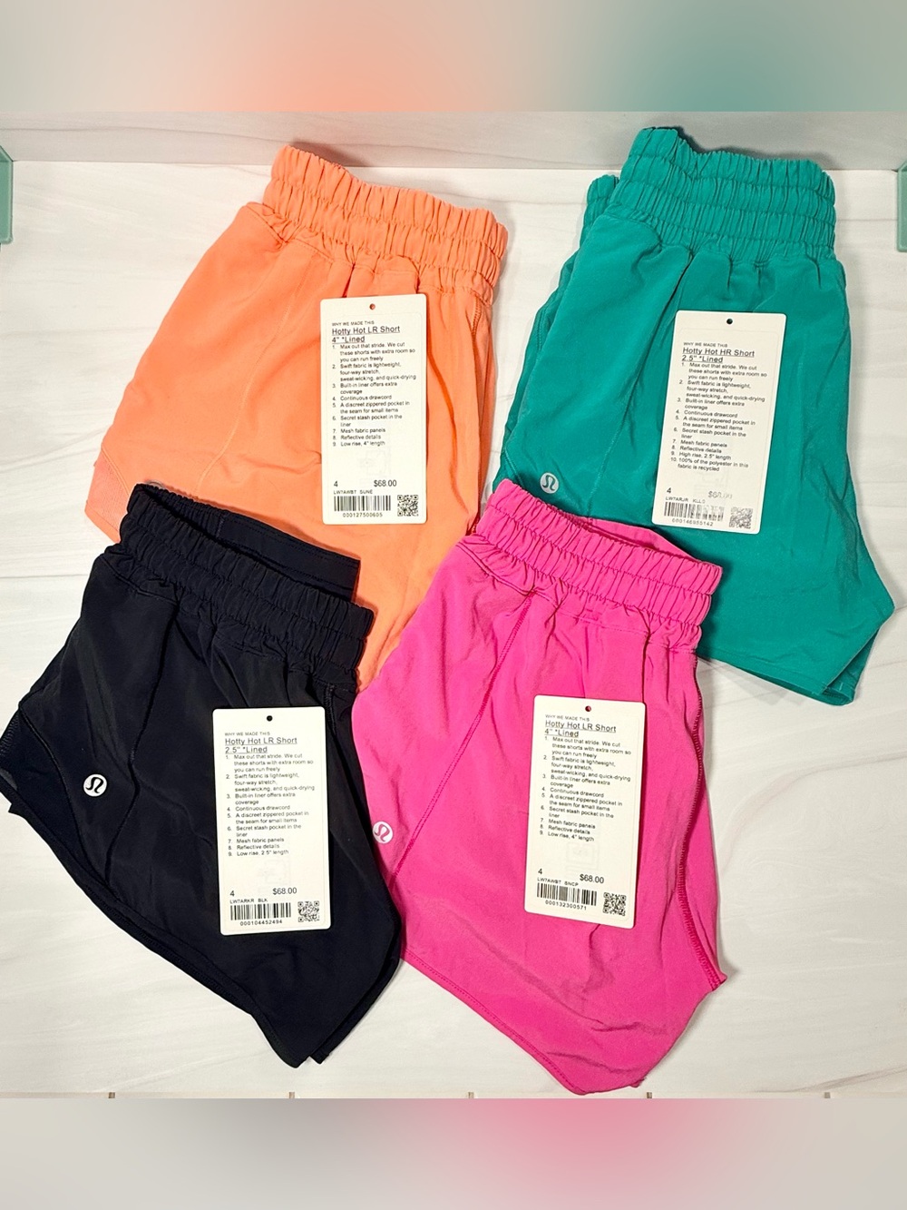 Lululemon Bundle Women’s Hotty Hot Shorts Pink, Teal, Coral, Black Size 4 EUC